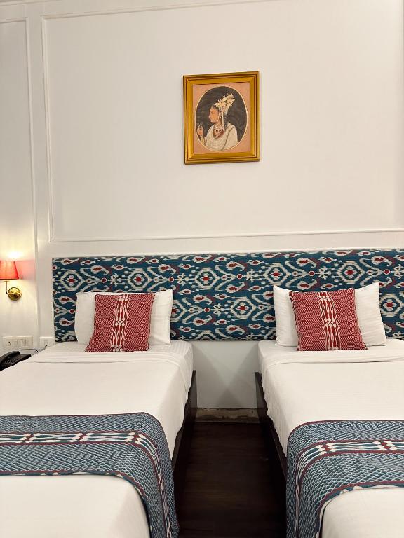 Postel nebo postele na pokoji v ubytování Hotel Atulyaa Taj