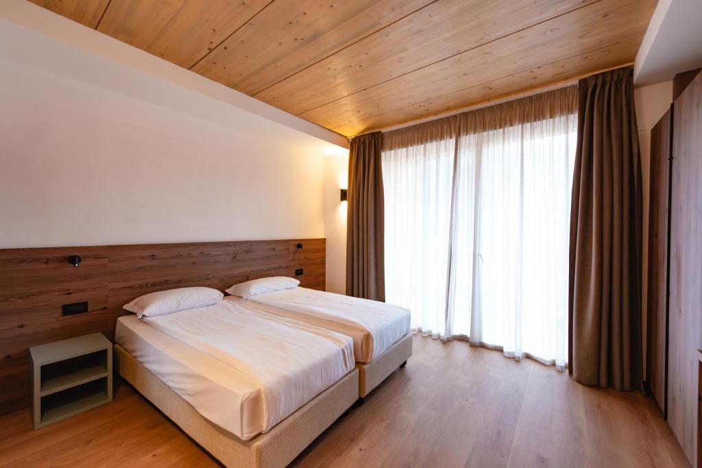 Postel nebo postele na pokoji v ubytování mySHH