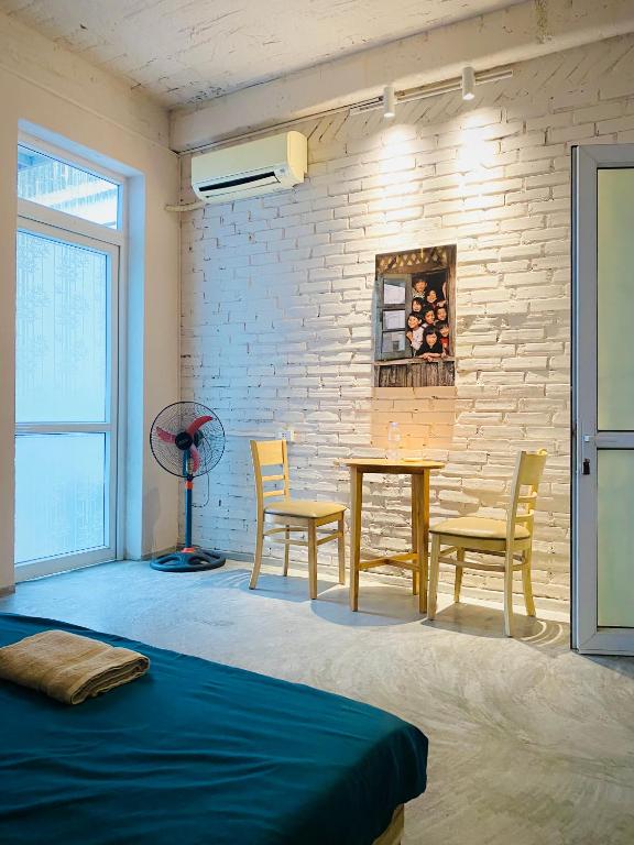 Postel nebo postele na pokoji v ubytování May's house (Nhà của Mây)