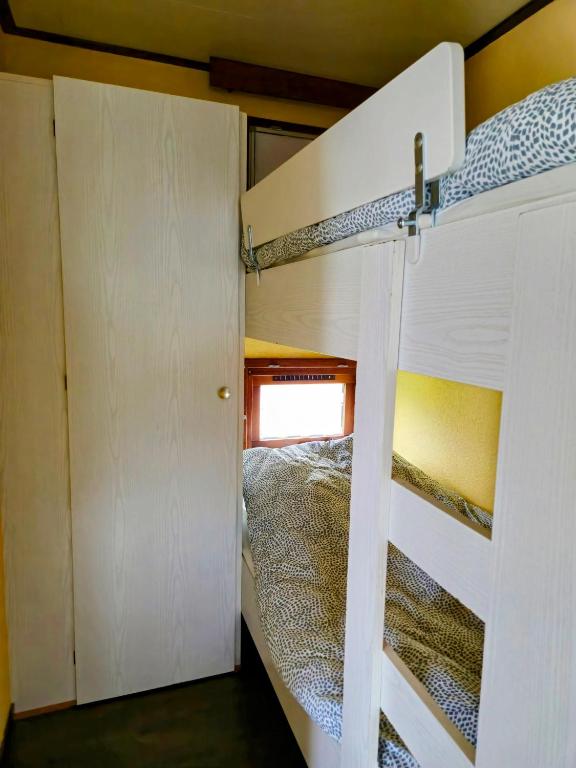 Postel nebo postele na pokoji v ubytování Chalet V31