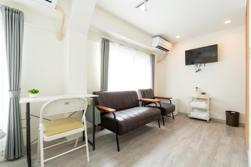 TV a/nebo společenská místnost v ubytování Kyoto Waka Hotel