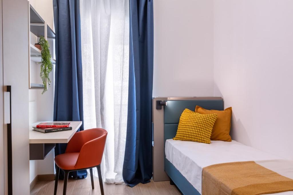 Voodi või voodid majutusasutuse JOIVY Cavour Luxury Apartments toas