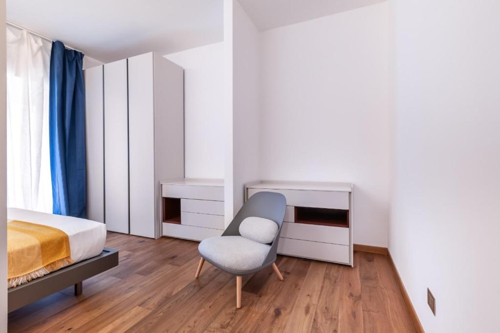Voodi või voodid majutusasutuse JOIVY Cavour Luxury Apartments toas