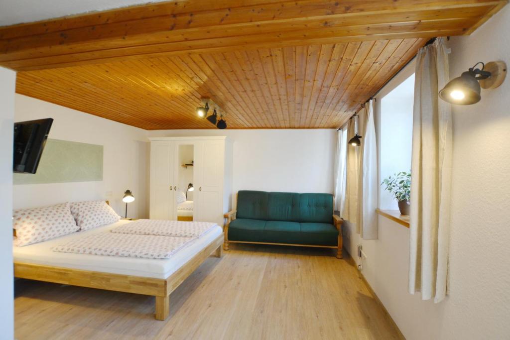 Postel nebo postele na pokoji v ubytování Möderlhof