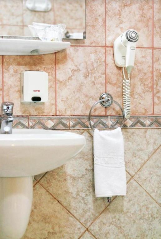 Koupelna v ubytování Hotel Premier