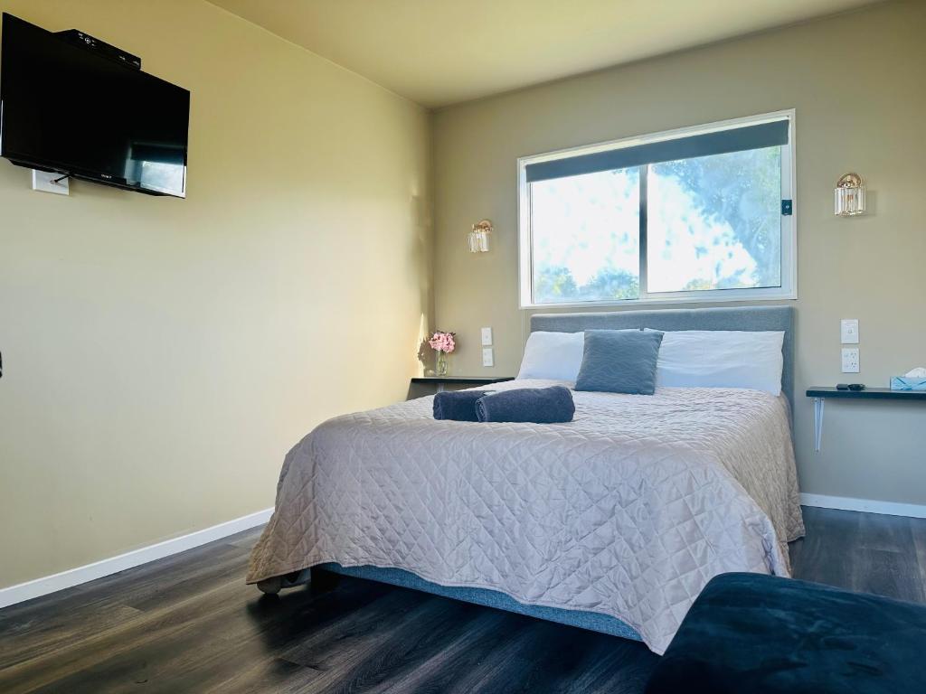 Postel nebo postele na pokoji v ubytování A1 Kaikoura Motel & Apartment
