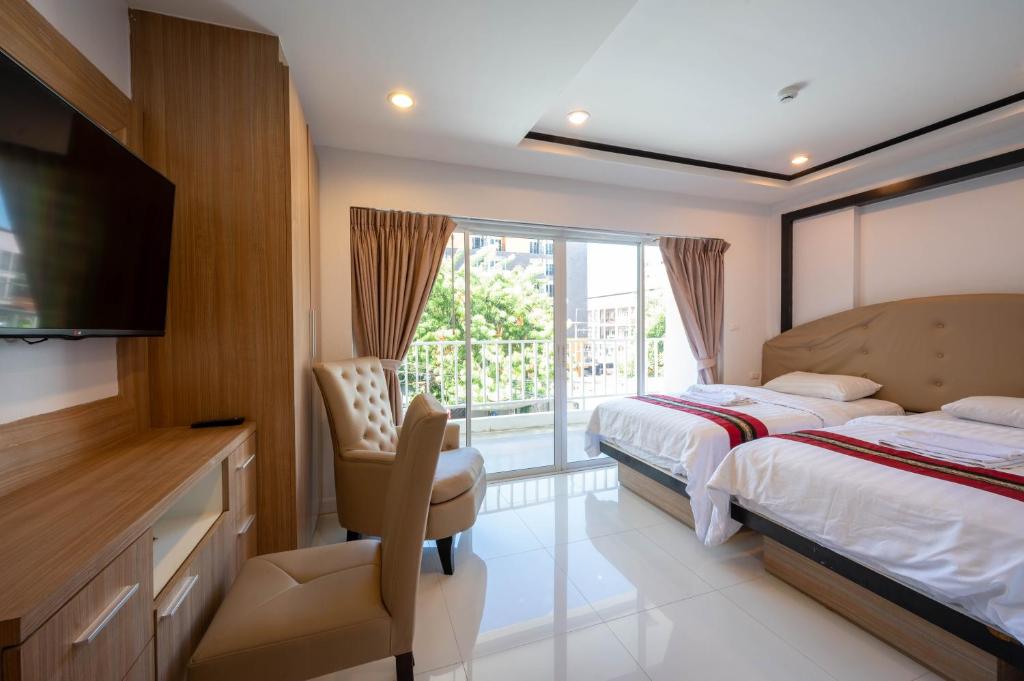 En eller flere senge i et værelse på New Nordic Trend 3 by Apartwell