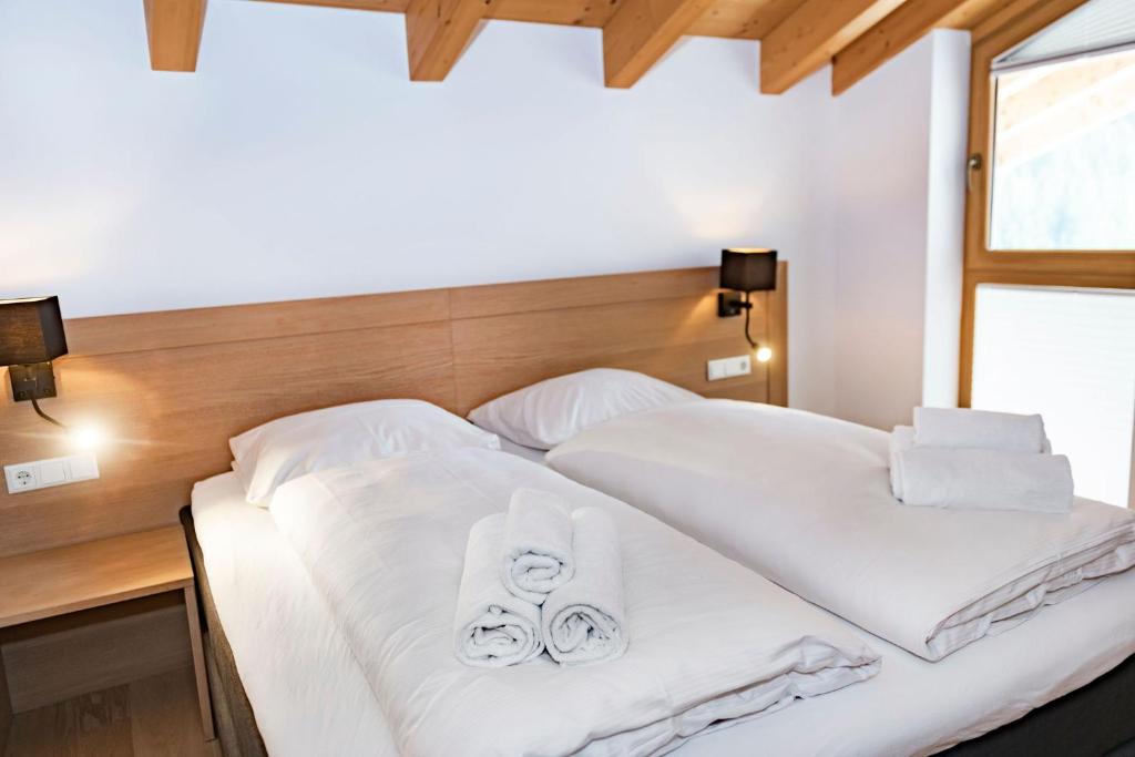 Postel nebo postele na pokoji v ubytování Residence Zillertal