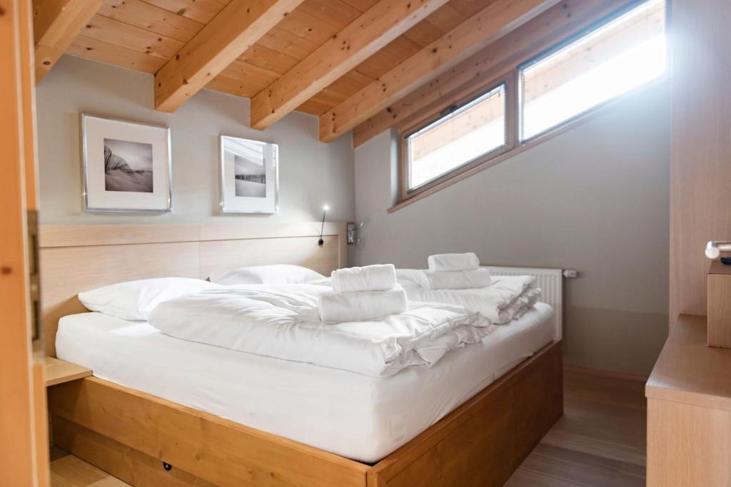 Postel nebo postele na pokoji v ubytování Residence Zillertal