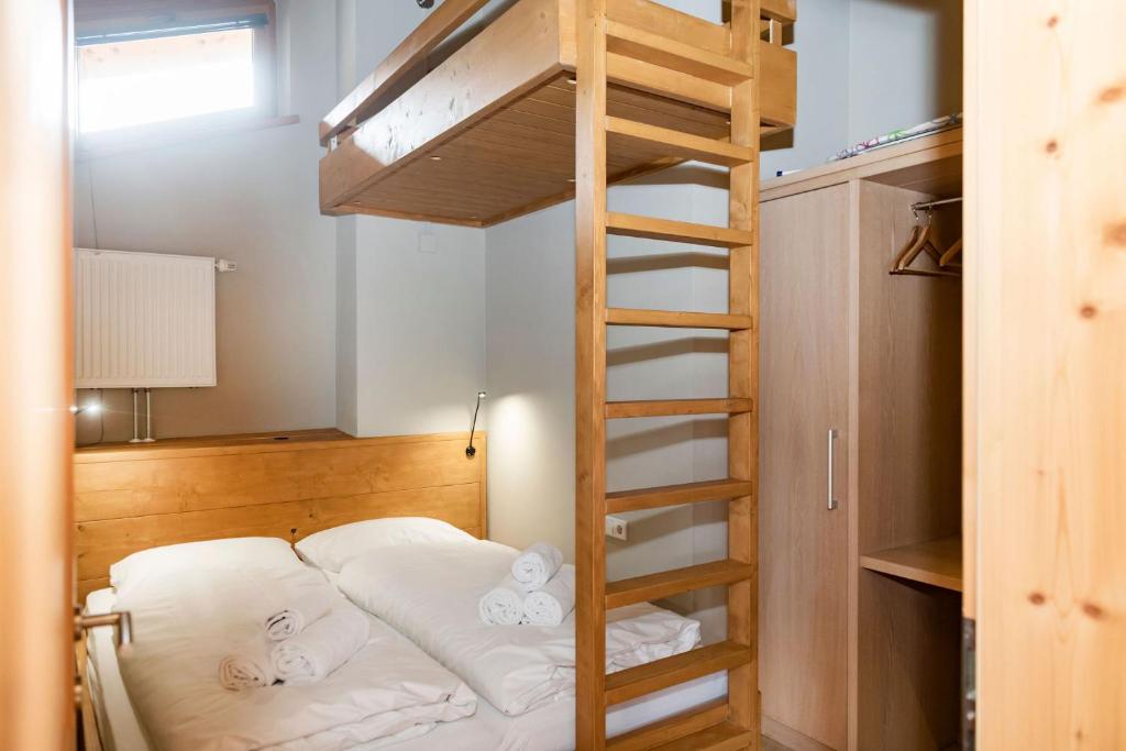 Postel nebo postele na pokoji v ubytování Residence Zillertal