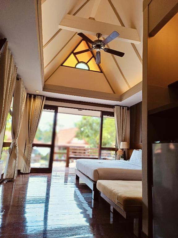 Postel nebo postele na pokoji v ubytování Baan Duangkaew Resort