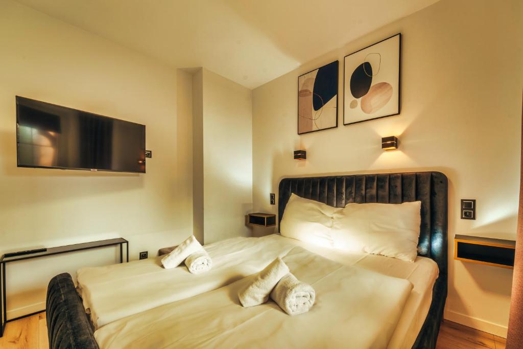 Posteľ alebo postele v izbe v ubytovaní Ametyst A2 - Apartament Rodzinny - Prywatna SAUNA