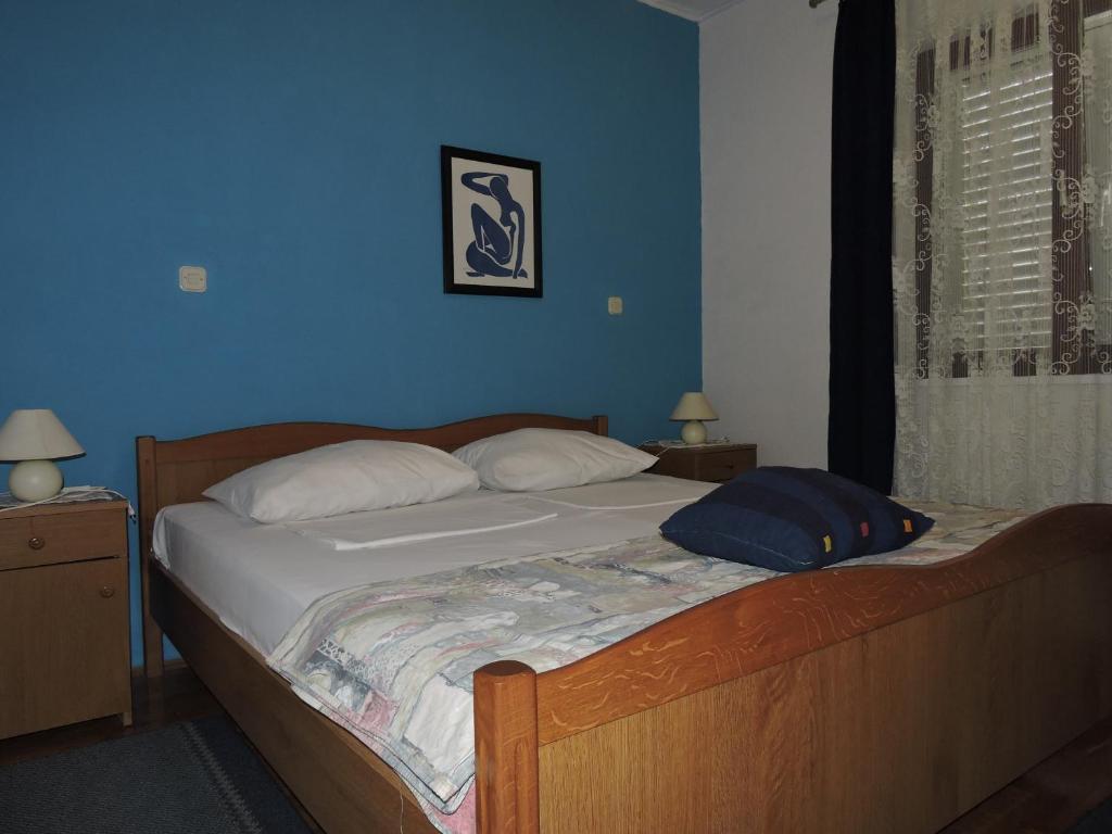 Postel nebo postele na pokoji v ubytování Apartments Ivanov