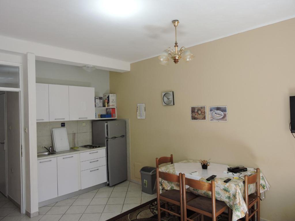 Kuchyň nebo kuchyňský kout v ubytování Apartments Ivanov