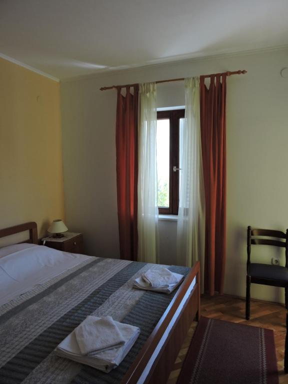 Postel nebo postele na pokoji v ubytování Apartments Ivanov