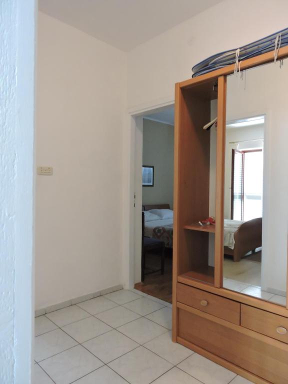 Postel nebo postele na pokoji v ubytování Apartments Ivanov