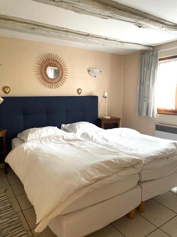 Postel nebo postele na pokoji v ubytování Gîte Nicole proche du Europa Park
