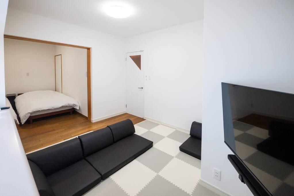 TV a/nebo společenská místnost v ubytování 禅ZEN Retreat Toyama