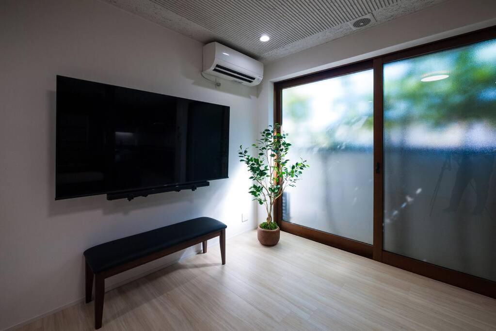 TV a/nebo společenská místnost v ubytování 禅ZEN Retreat Toyama