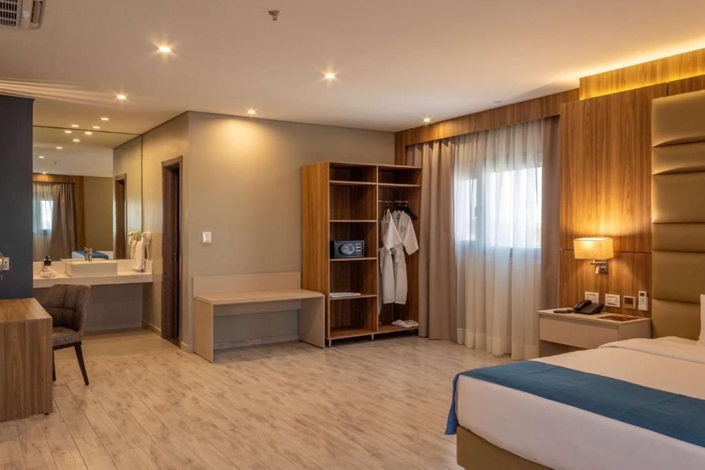 Uma cama ou camas num quarto em Tryp by Wyndham Asuncion