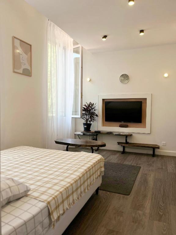 Postel nebo postele na pokoji v ubytování Studio lumineux avec belle vue