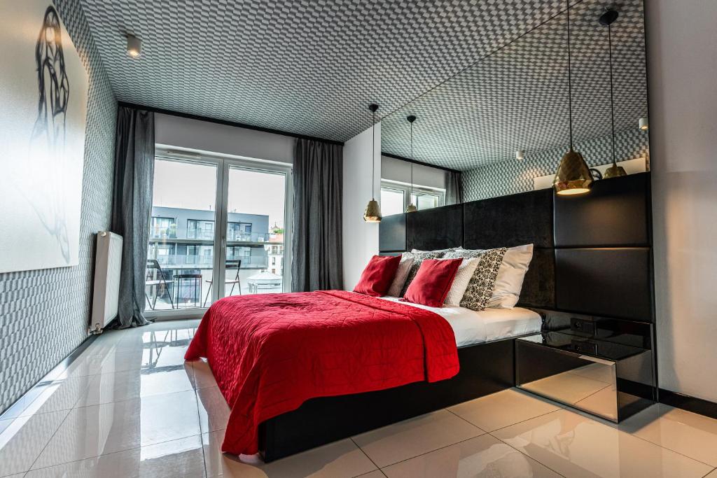 Postel nebo postele na pokoji v ubytování Apartamenty Homely Place Casa Verona - Stary Rynek - Parking