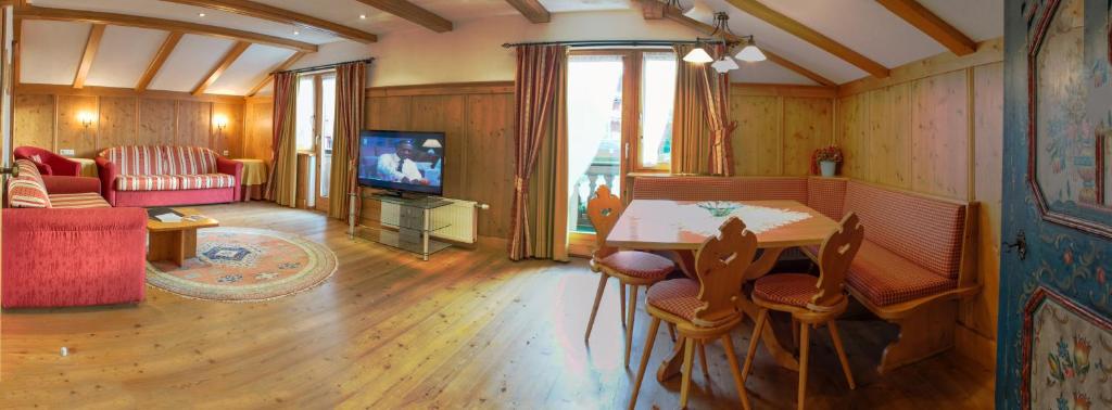 Televízia a/alebo spoločenská miestnosť v ubytovaní Gästehaus "Ski-Depot"