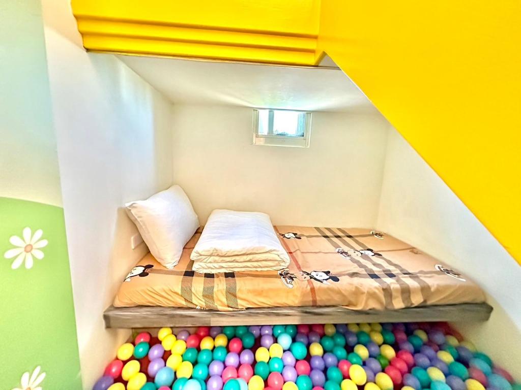 Postel nebo postele na pokoji v ubytování Little Apple B&B