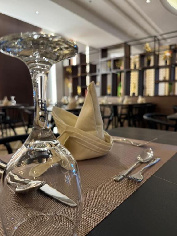 Restaurace v ubytování شقق ياس الفندقية