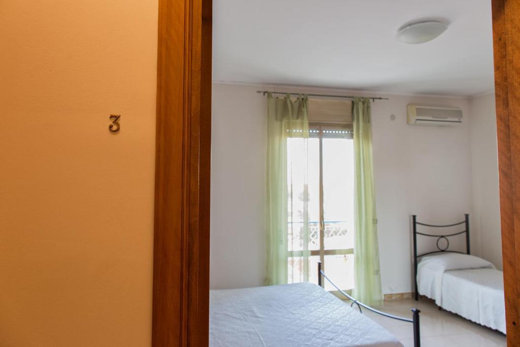 Кровать или кровати в номере Joanne B&B