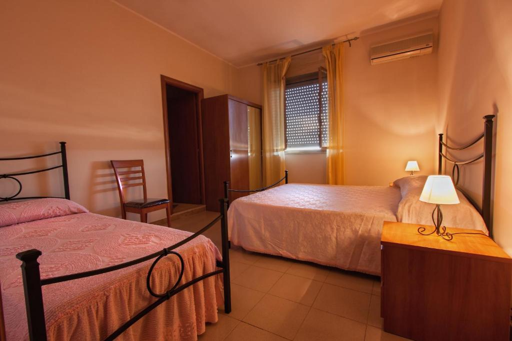 Кровать или кровати в номере Joanne B&B