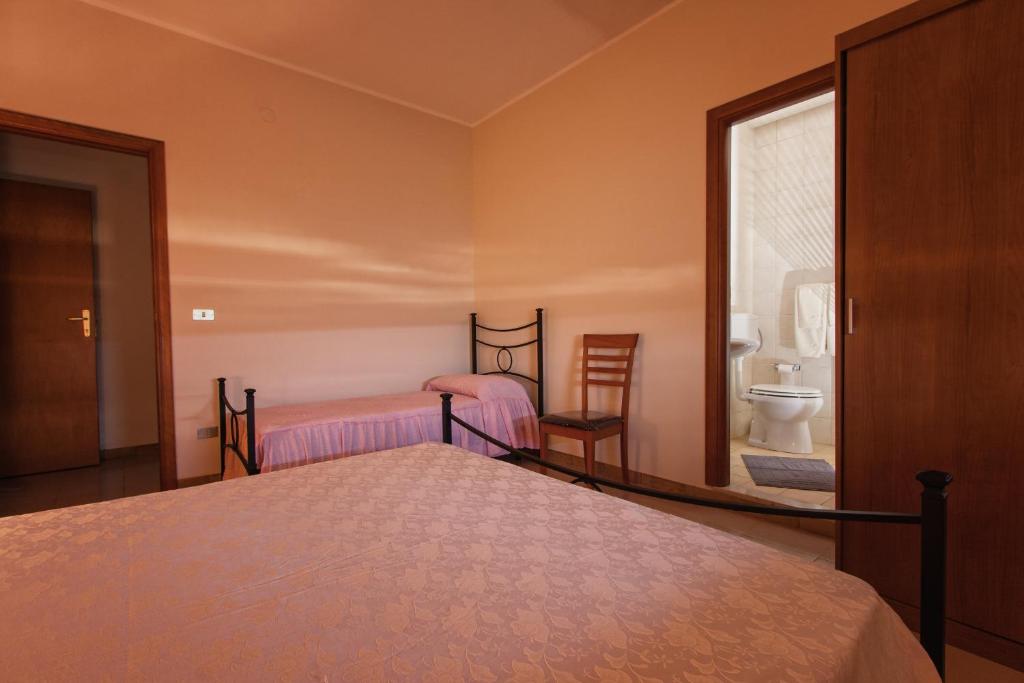 Кровать или кровати в номере Joanne B&B