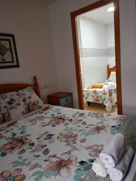 Postel nebo postele na pokoji v ubytování Hostal del Camino de Santiago