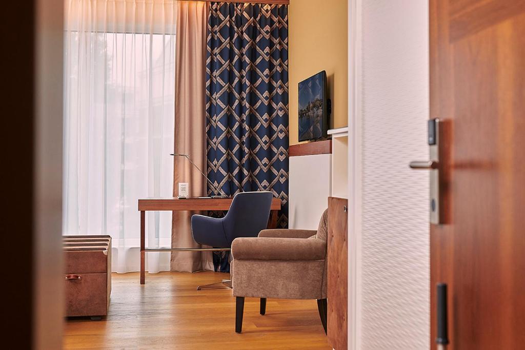 TV a/nebo společenská místnost v ubytování Hotel Hafenspeicher