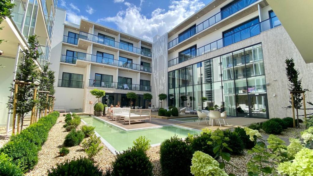 Vonkajšia záhrada v ubytovaní Verano Centrum Zdrowia i Relaksu