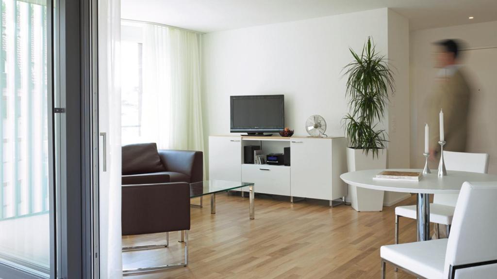 TV a/nebo společenská místnost v ubytování City Apartments