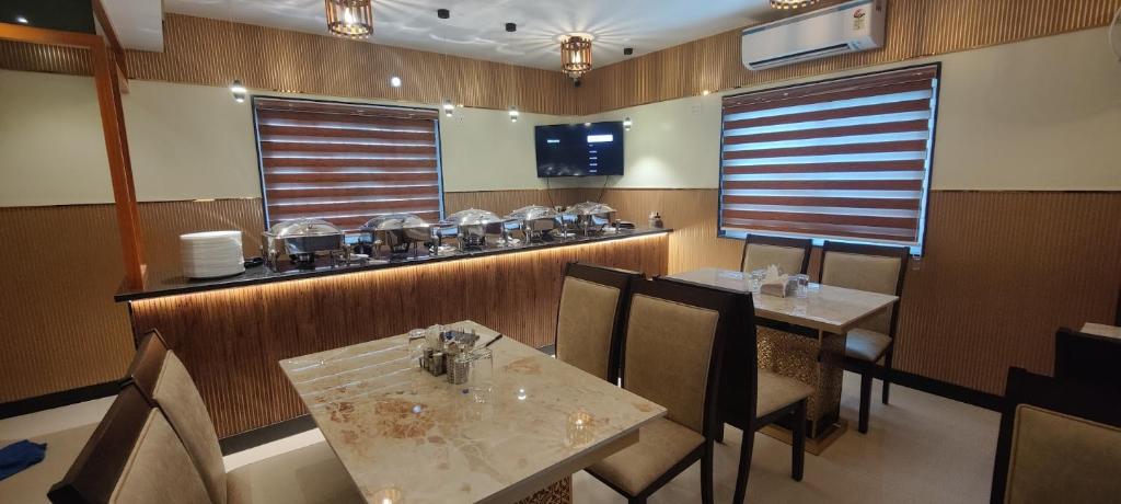 Posezení v ubytování Nandhavanam A Business Class Residency
