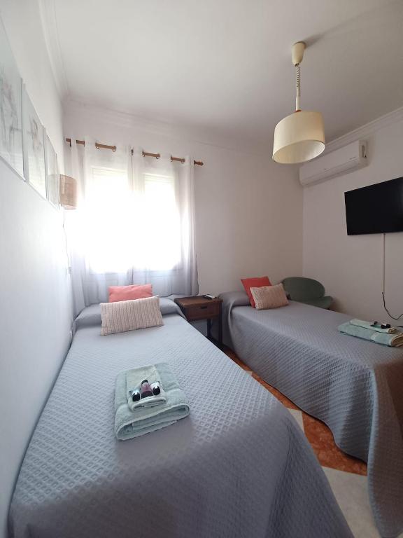 Posteľ alebo postele v izbe v ubytovaní Gibraltar Views Guest House