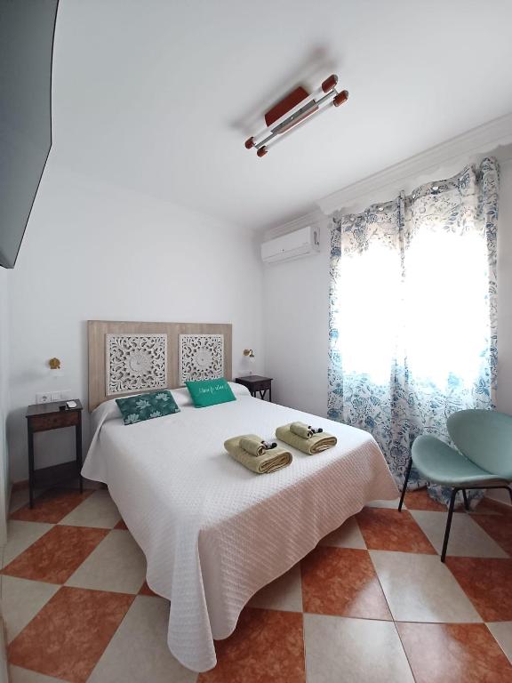 Posteľ alebo postele v izbe v ubytovaní Gibraltar Views Guest House
