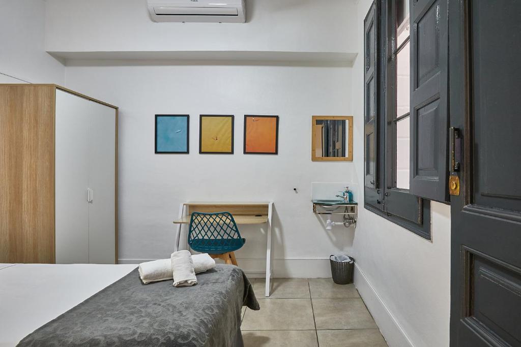 Posteľ alebo postele v izbe v ubytovaní Ella Hostel Gran Vía