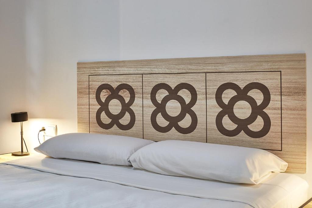Posteľ alebo postele v izbe v ubytovaní Ella Hostel Gran Vía