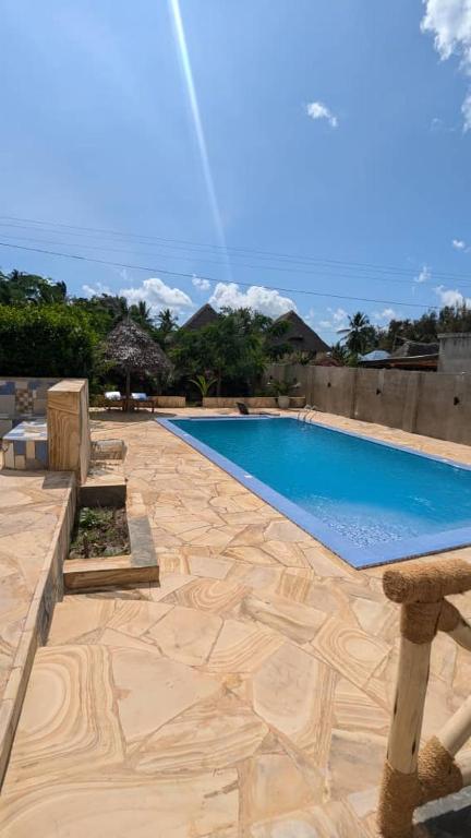 Bazén v ubytování Palm Heaven Villa nebo v jeho okolí