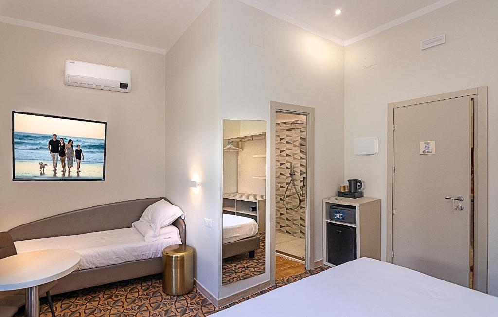 Postel nebo postele na pokoji v ubytování Hotel Eura
