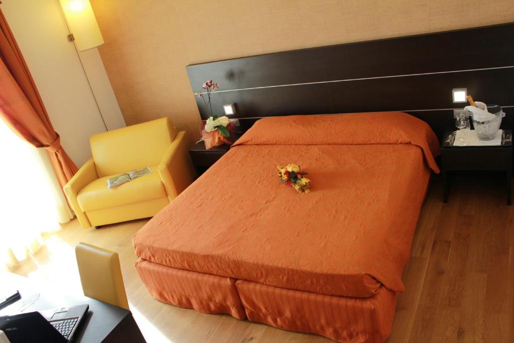 Postel nebo postele na pokoji v ubytování Hotel Rioverde