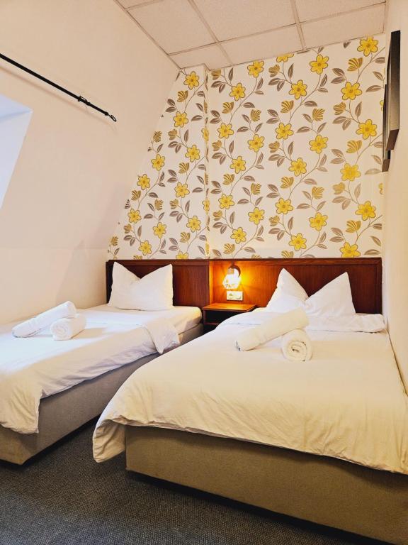 Postel nebo postele na pokoji v ubytování IKURA Hotel Self-check-in