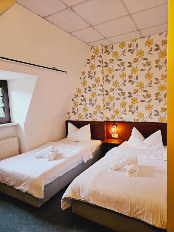 Postel nebo postele na pokoji v ubytování IKURA Hotel Self-check-in