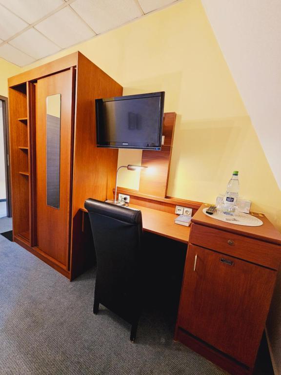 TV a/nebo společenská místnost v ubytování IKURA Hotel Self-check-in