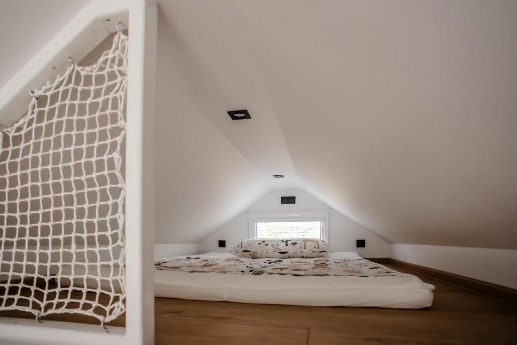 Postel nebo postele na pokoji v ubytování Glamping Osada