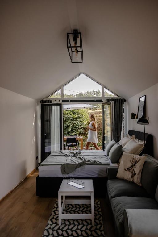 Postel nebo postele na pokoji v ubytování Glamping Osada