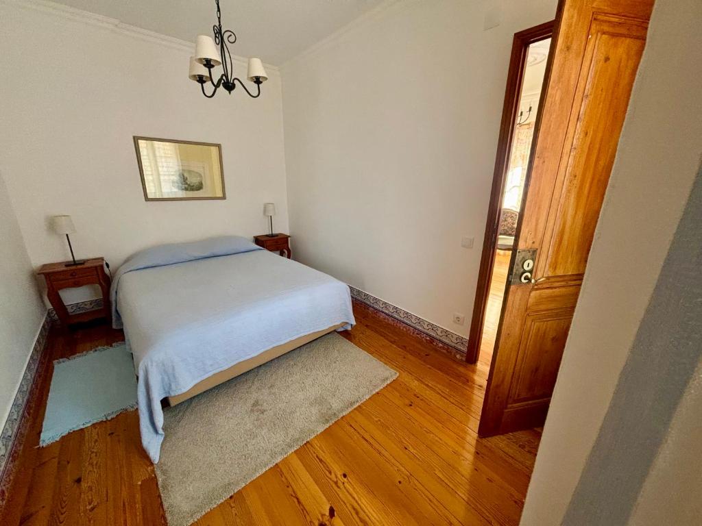 Postel nebo postele na pokoji v ubytování Casa da Villa 1B